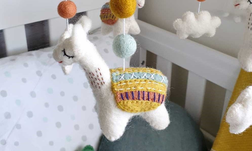 5 Extra Benefits of a Baby Nursery Mobile - Tik Tak Design Co.